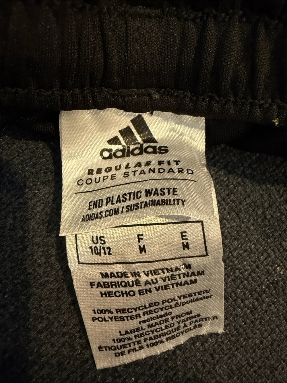 Adidas Black Athletic Shorts with Orange, Yellow, and Green Accents